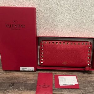 Authentic barely used Valentino rock stud red zippered wallet.